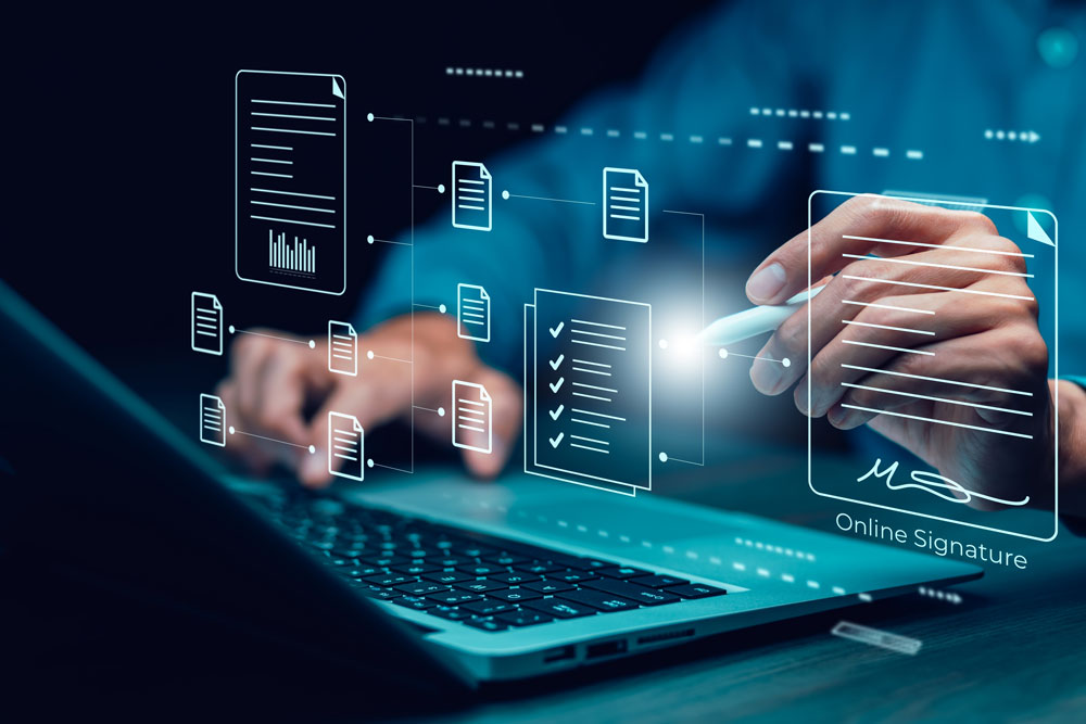 IT support technician working on a laptop in Wilmington, NC